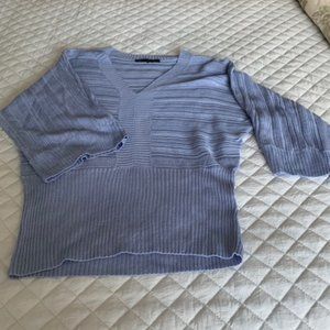 Periwinkle-colored sweater